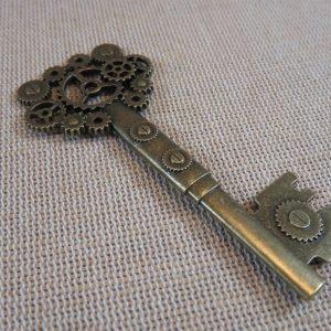 Pendentif clé Steampunk engrenage métal bronze 72mm