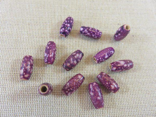 Perles ovale en bois violette tacheté 15x7mm - lot de 10