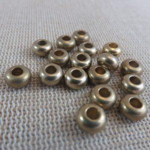 Perles entretoise donuts cuivre laiton 7mm – lot de 20