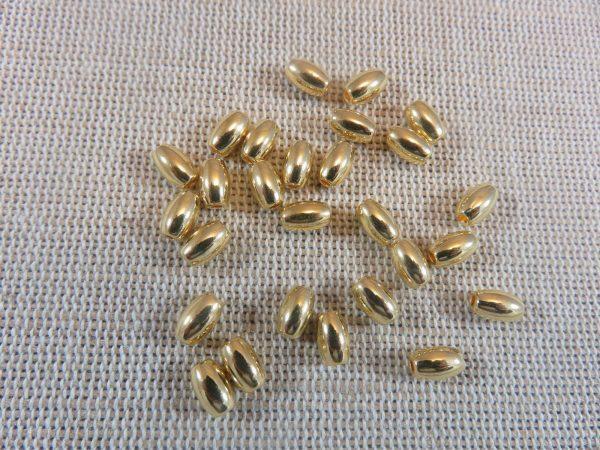 Perles tonneau ovale doré 6mm grain de blé - lot de 20