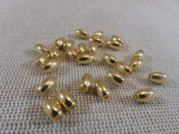 Perles tonneau ovale doré 6mm grain de blé - lot de 20