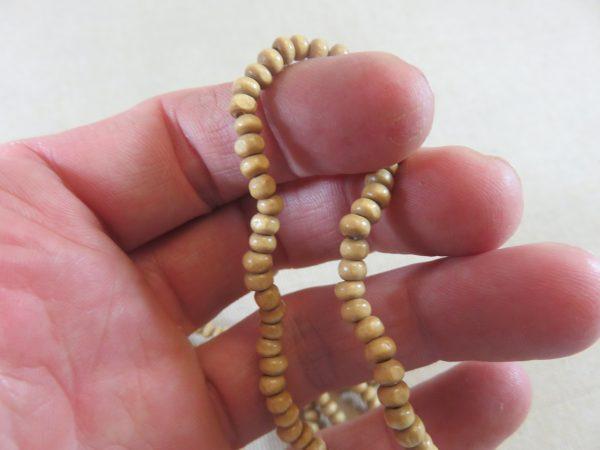 Perles en bois rondelle 4mm marron clair - lot de 25