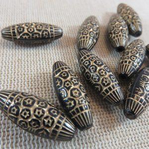 Perles ovale gravé fleur noir et or 23x9mm acrylique – lot de 10