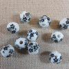Perles céramique fleur noir 8mm ronde