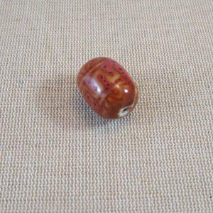 Perle céramique ovale rouge 17mmx11mm