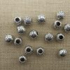 Perles métal ronde martelé coloris argenté 7mm