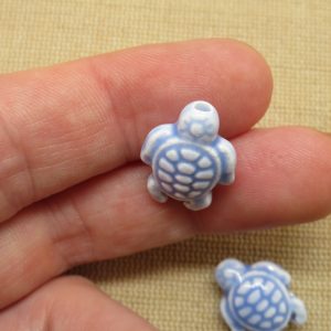 Perles céramique tortue bleu violet 19x15mm – lot de 2
