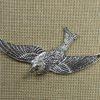 Pendentif oiseau argenté 73x35mm en métal - breloque animaux