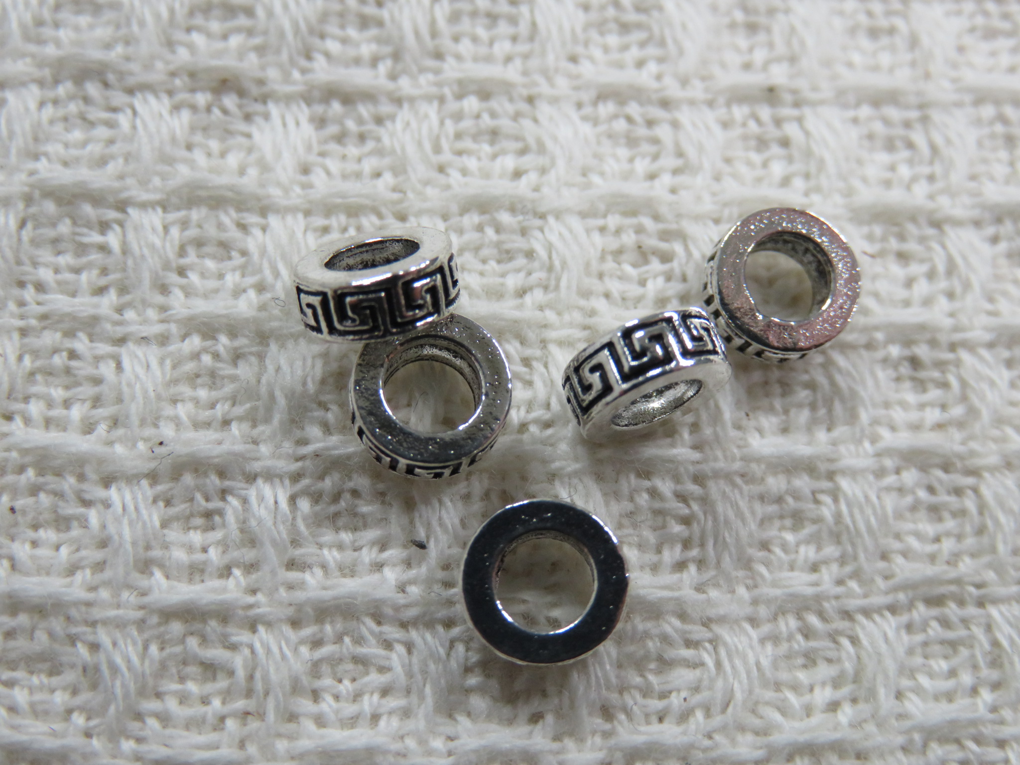Perles rondelle 6mm argenté gravé ethnique en métal