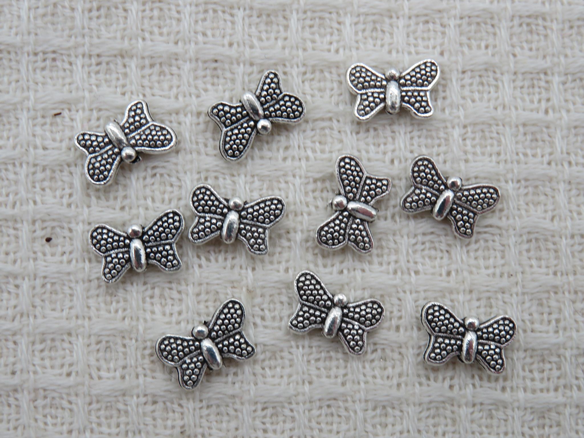 Perles papillon argenté 10mm en métal
